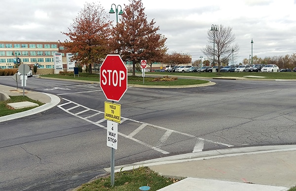 Stop sign with non-MUTCD components 
