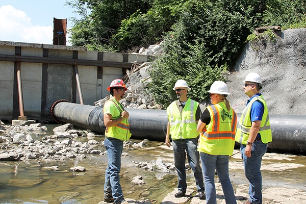 SKW team members visit the Turkey Creek bulkhead site.