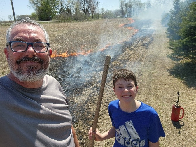Aaron and family burning ground